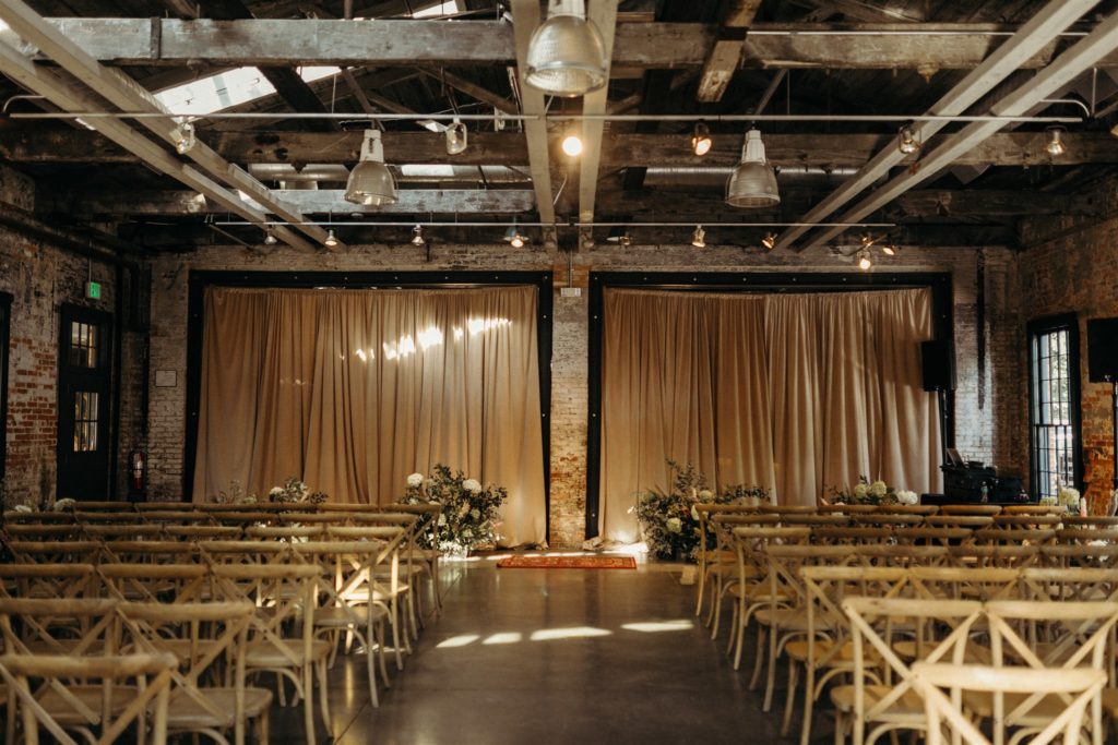 mt washington mill dye house the one moment events paige and mihir wedding ceremony rustic industrial