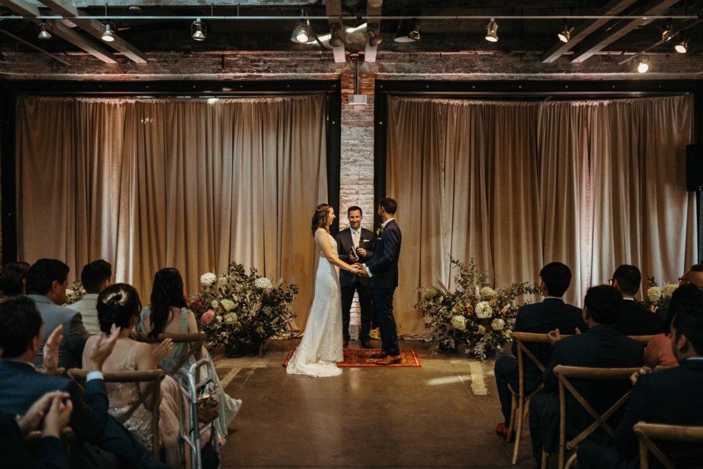 mt washington mill dye house the one moment events paige and mihir wedding ceremony rustic industrial indian wedding