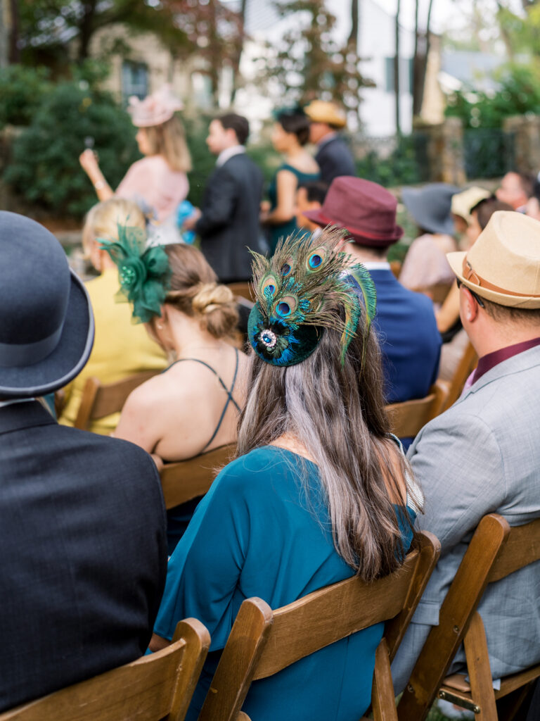 what do I wear to a garden wedding? Why, a peacock hairpiece of course! 