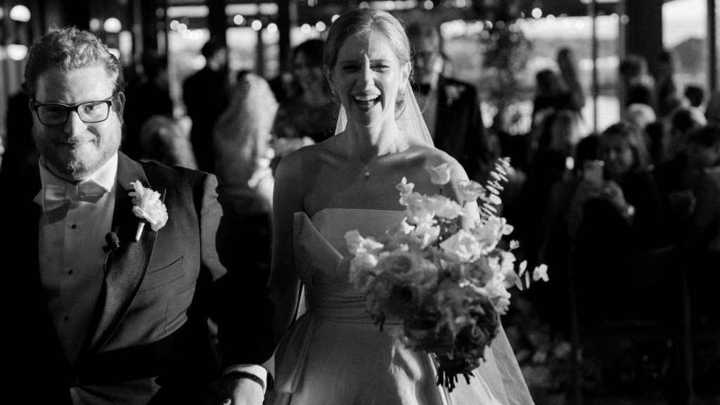 a fall wedding in DC by The One Moment Events.  A jewish wedding with a chuppah adorned with fall flowers 