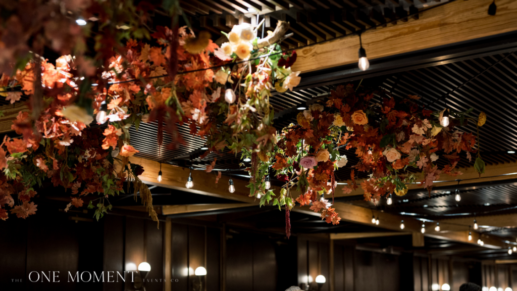 a fall wedding in DC by The One Moment Events. A fall canopy of leaves in the district at District Winery