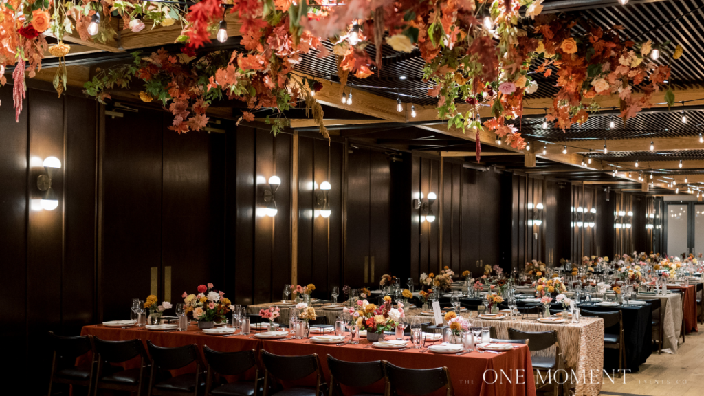 a fall wedding in DC by The One Moment Events. A moody tablescape with textured and patterned linens and fall flowers at District Winery