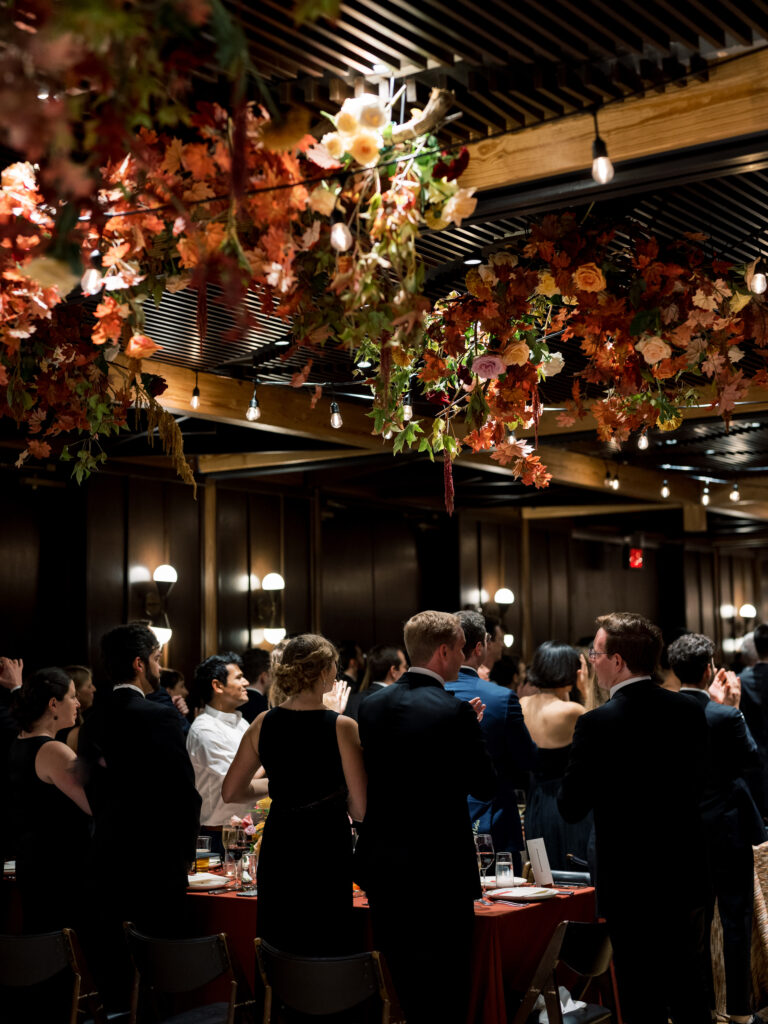 a fall wedding in DC by The One Moment Events. A moody tablescape with textured and patterned linens and fall flowers at District Winery