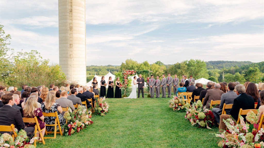 Bride and groom at hilltop ceremony at Tranquility Farm in Virginia