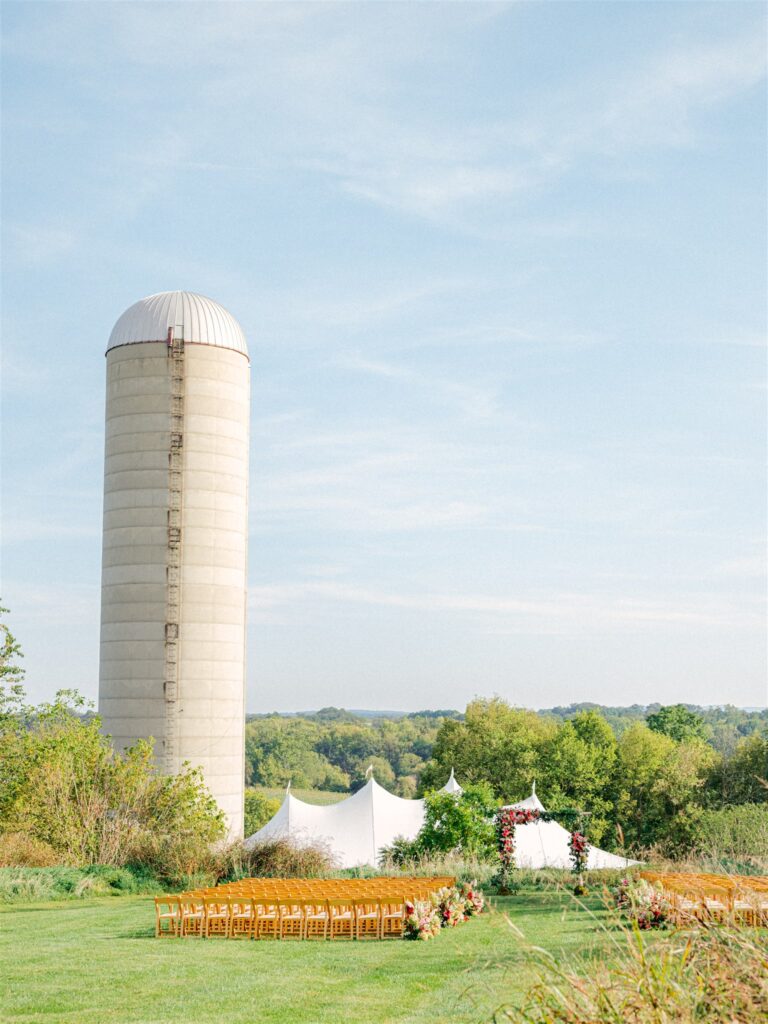 Bride and groom at hilltop ceremony at Tranquility Farm in Virginia