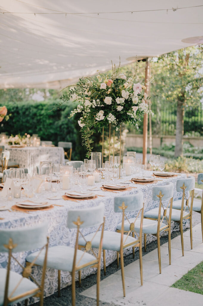 Elevated Lowcountry wedding reception design at the Gibbes Museum featuring a French blue and sage green palette with custom art-inspired details by The One Moment Events.