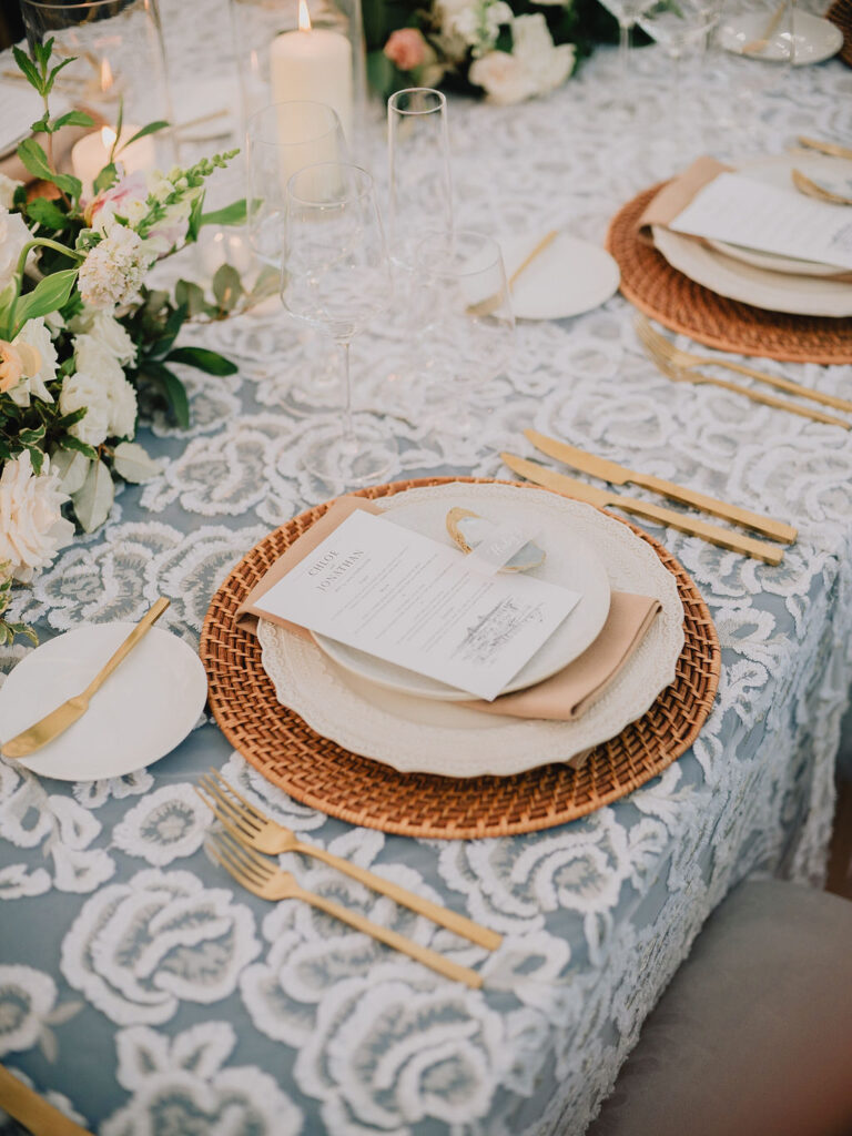 Elevated Lowcountry wedding reception design at the Gibbes Museum featuring a French blue and sage green palette with custom art-inspired details by The One Moment Events.